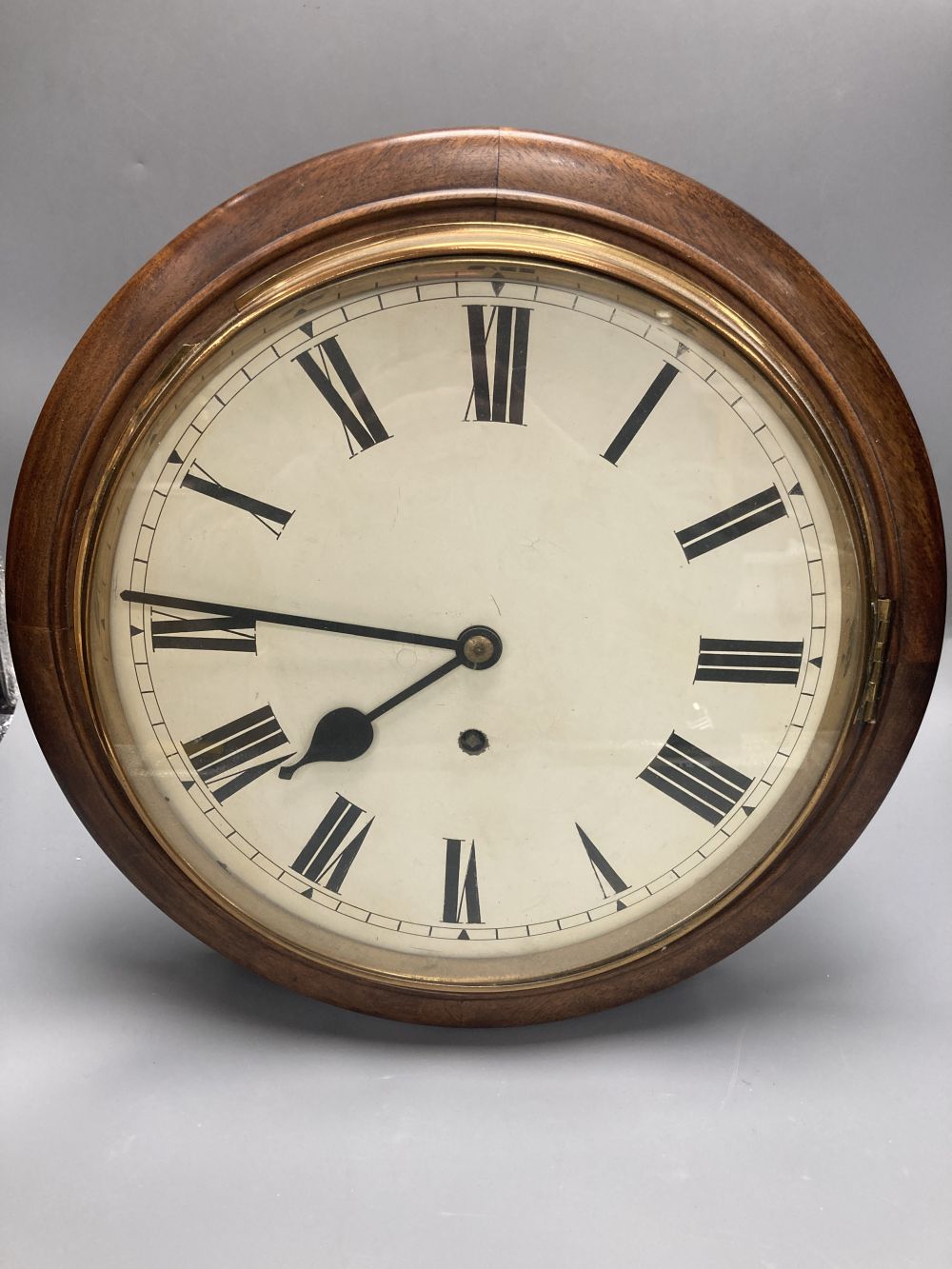 An American mahogany cased wall dial timepiece, 38.5cm